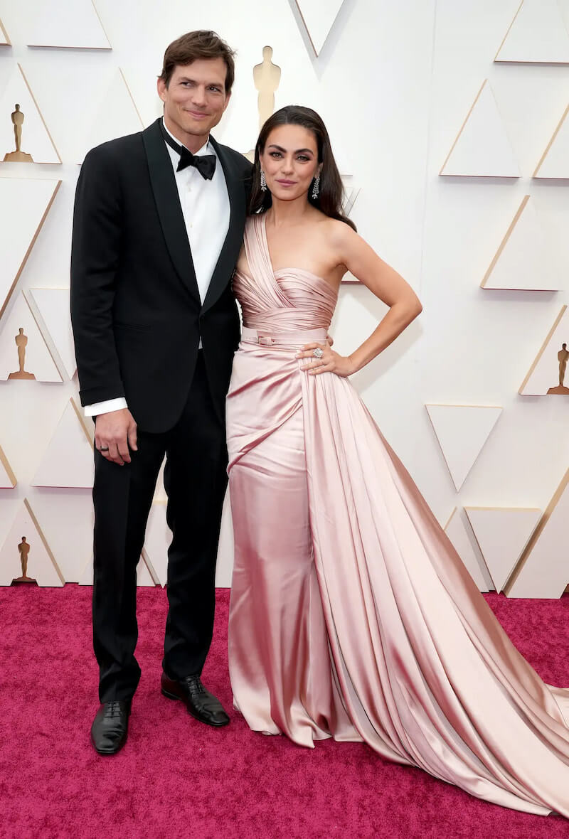Ashton Kutcher and Mila Kunis at the Oscars - KEVIN MAZUR/GETTY IMAGES
